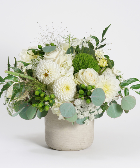 white and green flower arrangement with unique textural accents